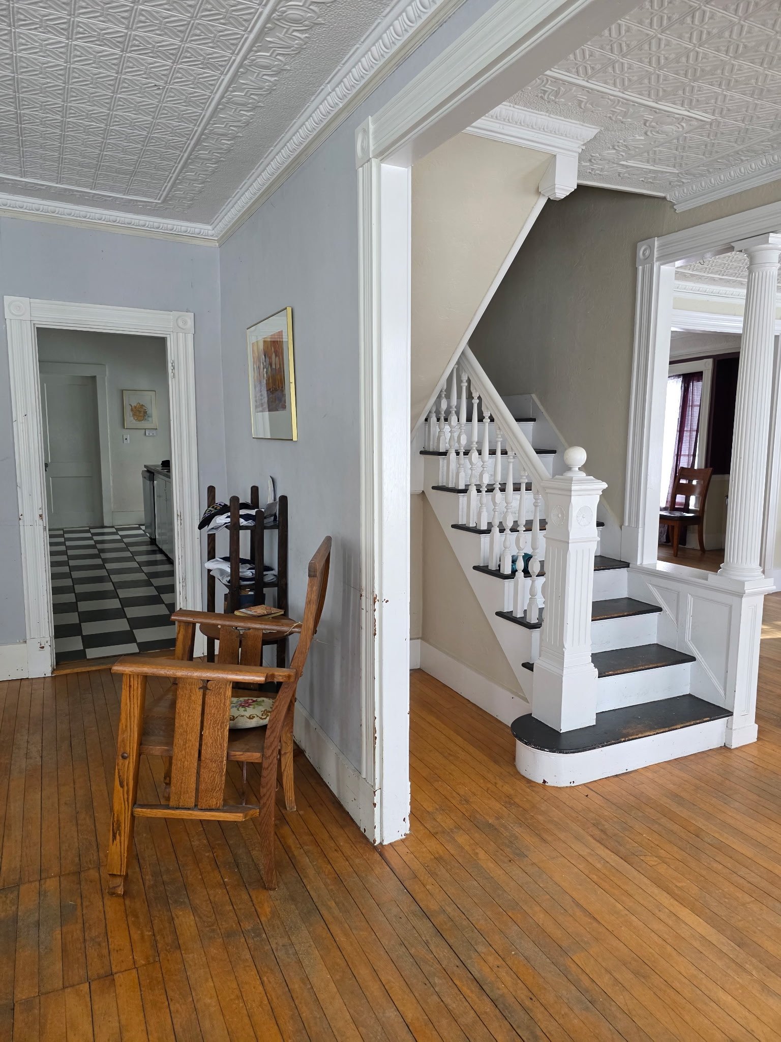 The main-house staircase and adjoining rooms.